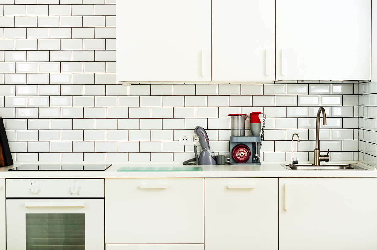 white kitchen tile backsplash